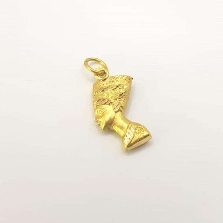 Ciondolo viso egizio