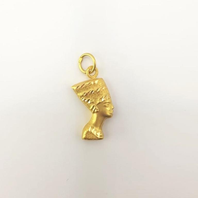 Ciondolo viso egizio